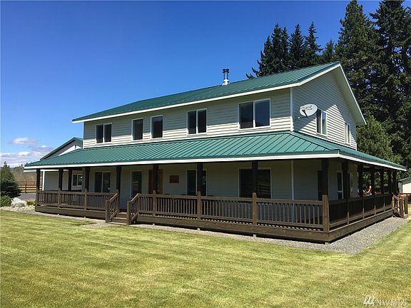 The covered wrap around deck offers a great place to relax and enjoy the views in every direction.