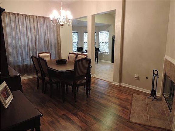 Easily seat 8 in this fabulous dining room with fireplace.