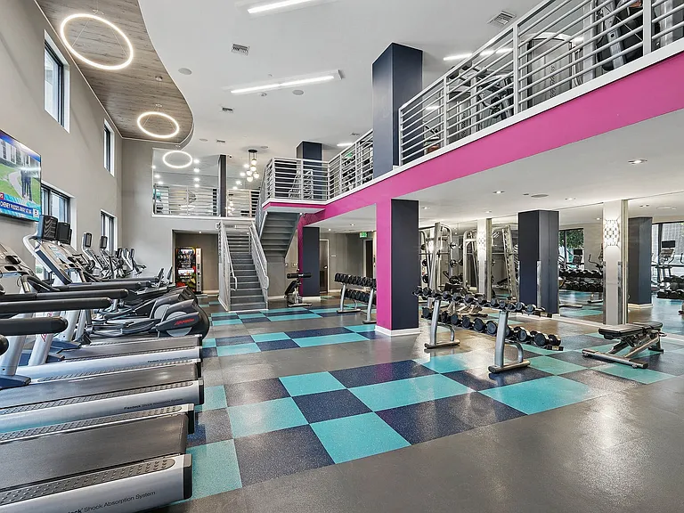 24/7 fitness center with cardio and strength training equipment