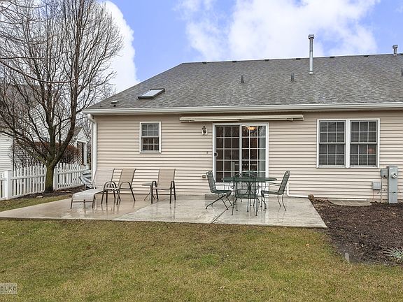 A 10' x 12' concrete patio was recently added to the existing patio to create this awesome outdoor s