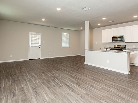 Family Room to Kitchen and Dining Area