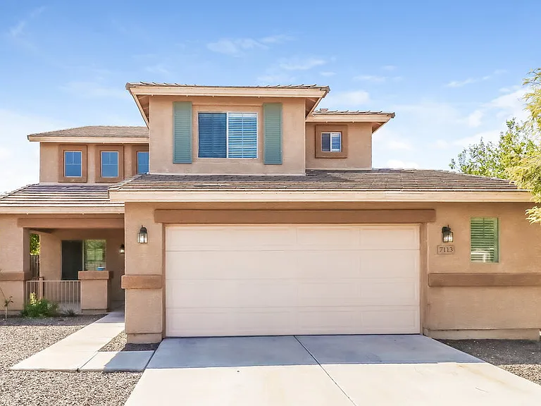 7113 W Winslow Ave — Photo 1
