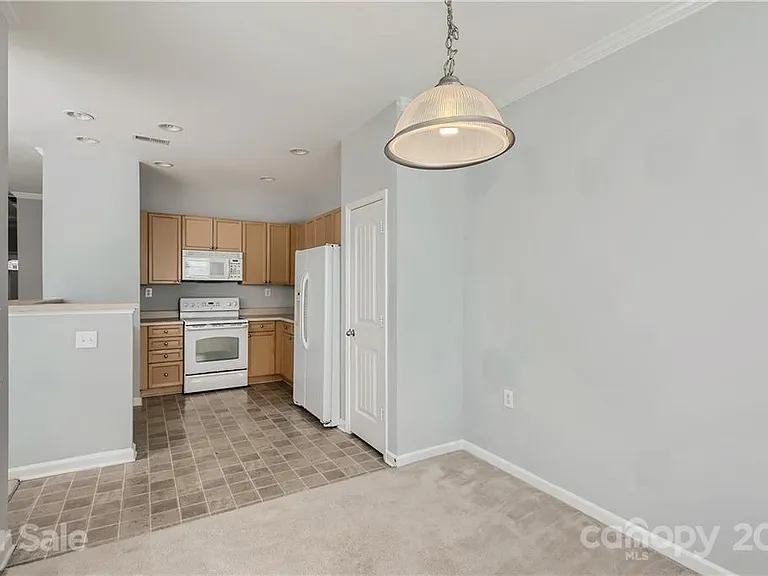 New flooring and paint throughout, new refrigerator,