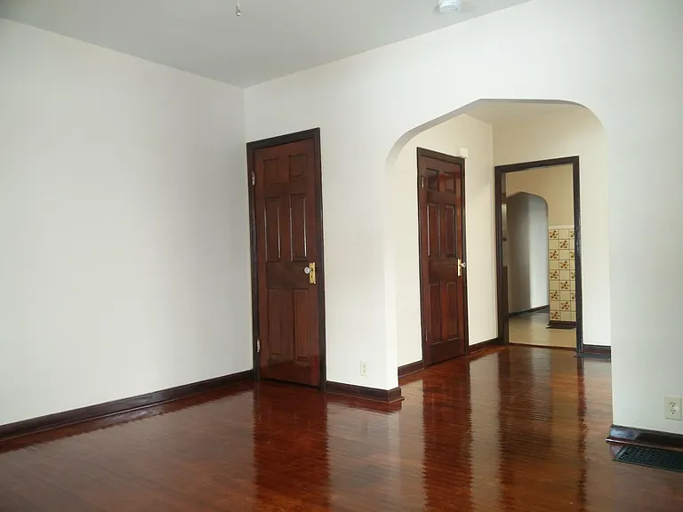 Two large closets for lots of storage space. Nice turn of the century arched passage!