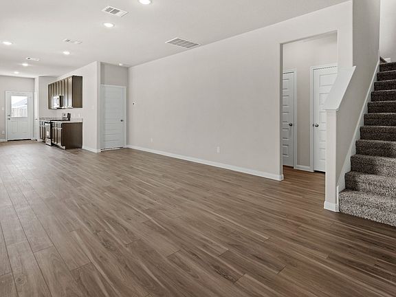 Family Room to Dining Area and Kitchen