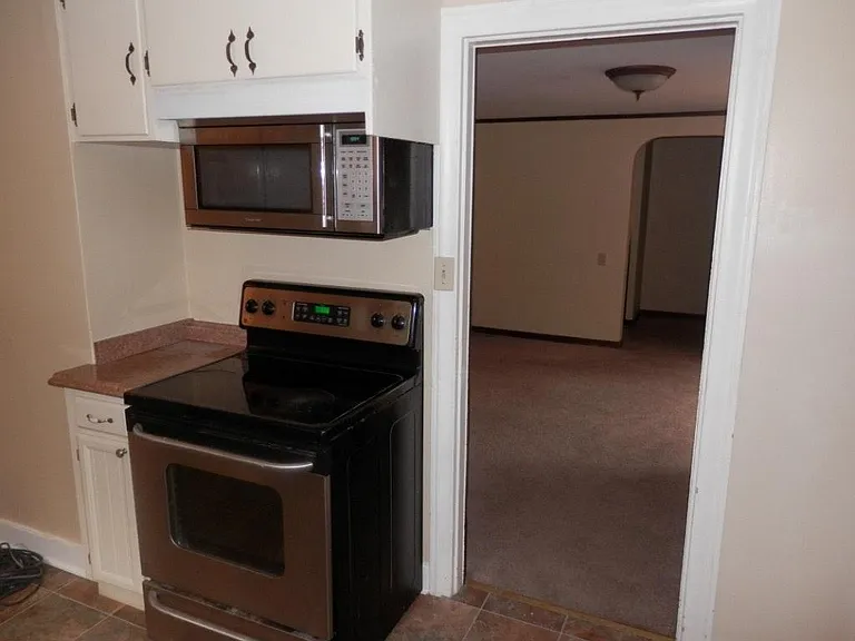 Kitchen leading to dining room