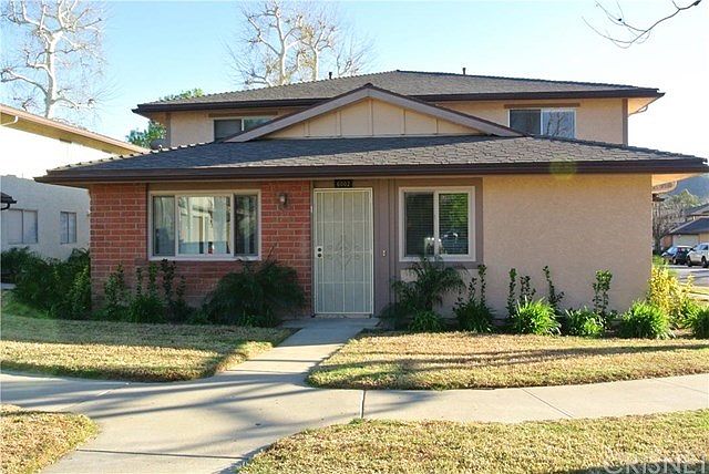 Front of building. Unit is upper level back unit.