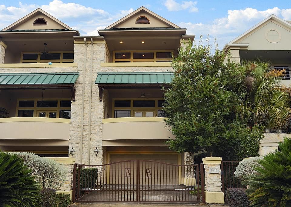 Front:
Down a peaceful, well maintained street sits this beautiful three story townhome. With only a short walk to Memorial park and a private security gate this home offers location, space and privacy.
