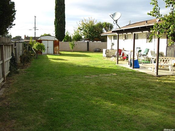 Covered patio and storage shed.