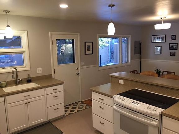 private patio and corner side yard off kitchen