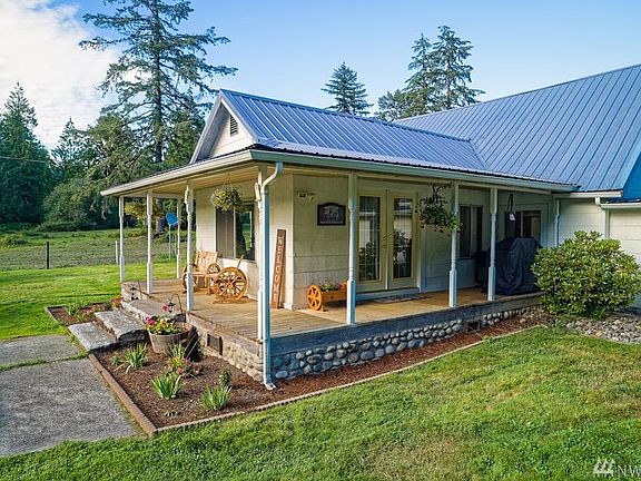 Home has a wrap around deck around the front of the home. 