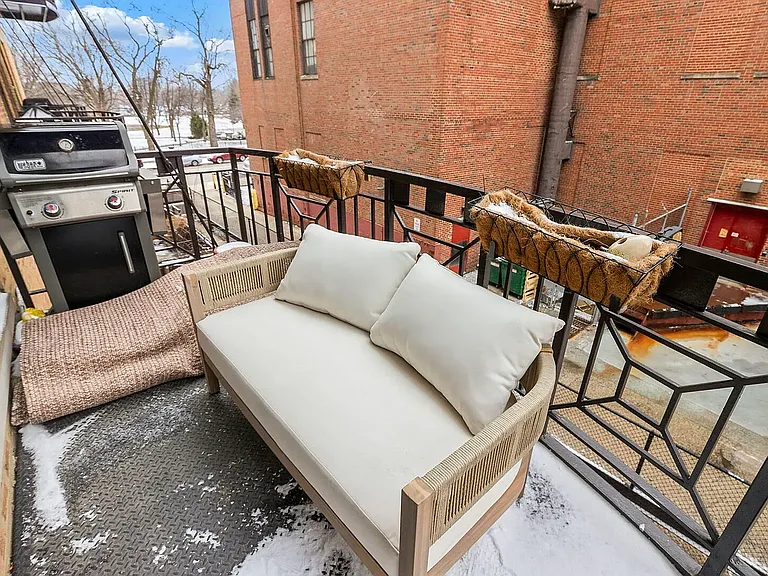 Patio connected to the main living area with views of Skinner Park to the south