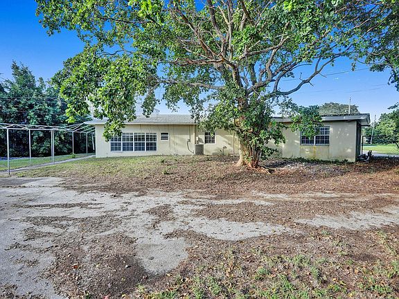 Back Yard in Large Parking Asphalt Path in ACREs