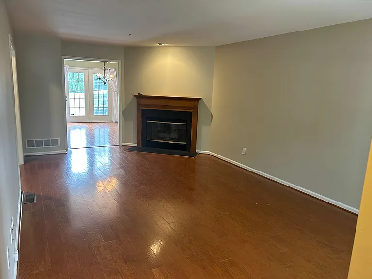 Large living room with gas fireplace