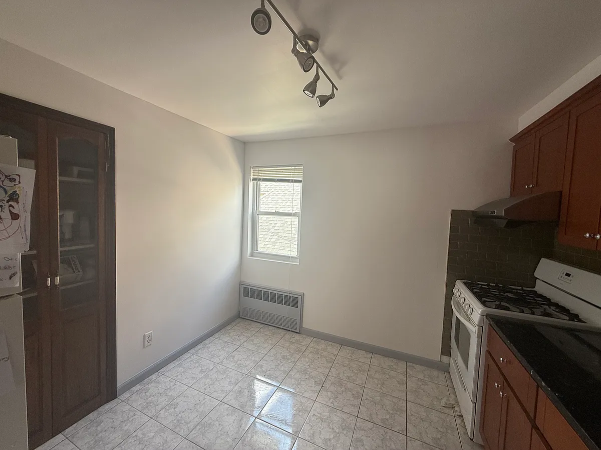 Building Photo - 1323 74th St #3