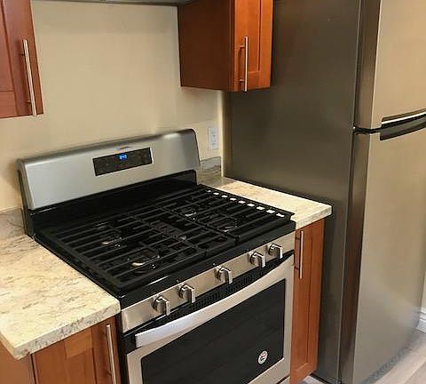 New Whirlpool refrigerator and gas stove