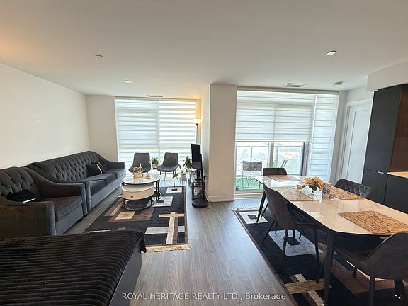 2nd image of 225 Village Green Sq E #409