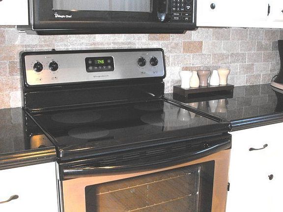 New stove and microwave go with home!