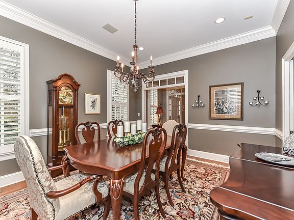Formal Dining Room with Chair Rail and Chandelier