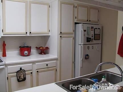 Kitchen
						:
						Renovated a few years ago. New flat surface stove and built in microwave.