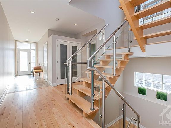 Front entrance, with coat closet and powder room