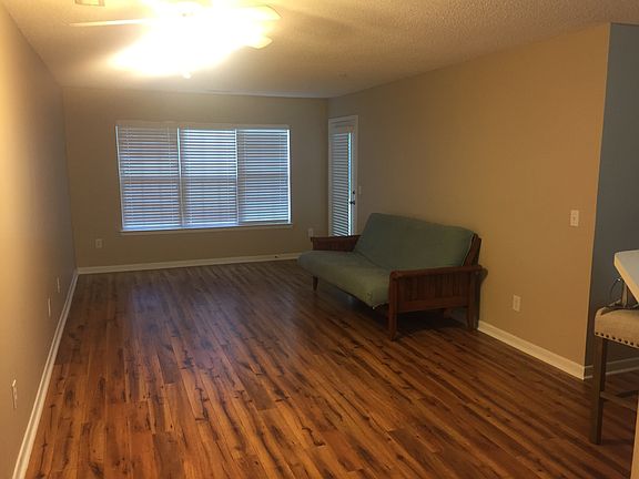 Large living area. Lots of natural light. Futon free with re