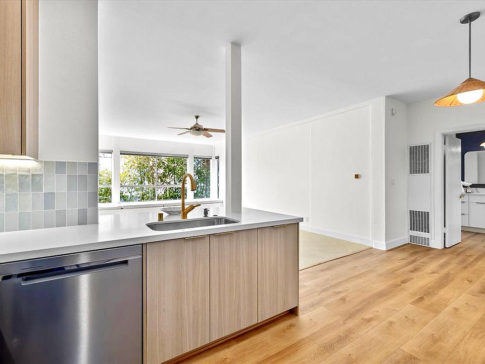 New luxury vinyl wide-plank flooring throughout the entry, kitchen, dining room and bathroom.