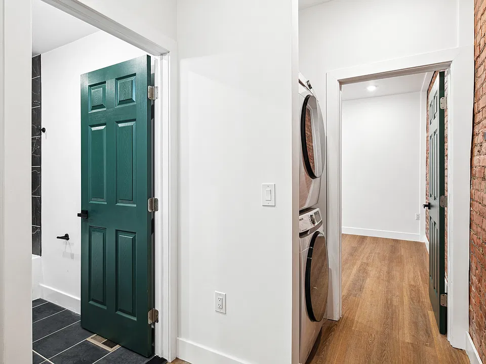 DOUBLE STACKED WASHER AND DRYER - HALLWAY.