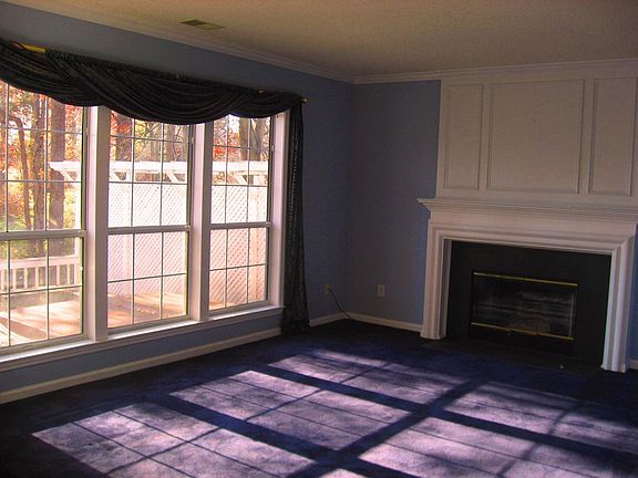 Family Room with Wood Burning Fireplace