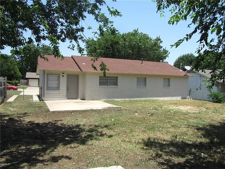back of house with great backyard.
