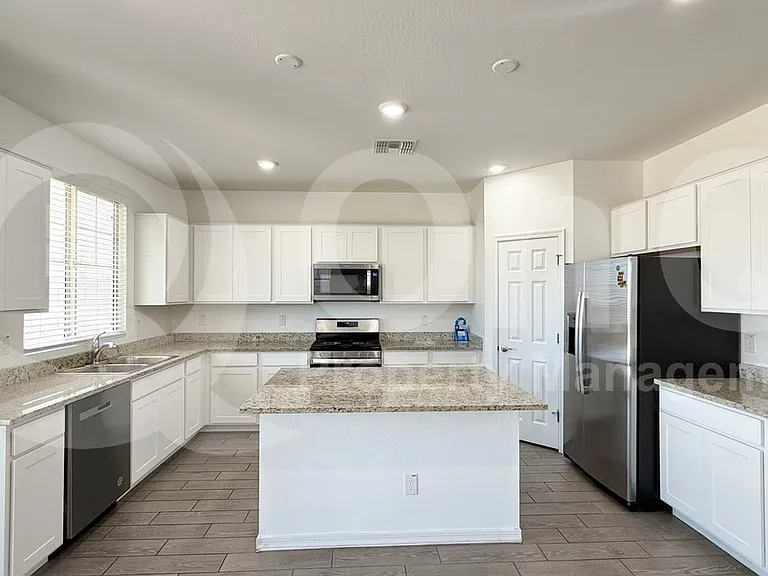 10838 W Marguerite Ave — Photo 7