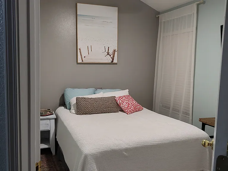 Bedroom 2 - Large enough for a Queen bed, remote control ceiling fan with multiple light setting. Vaulted ceiling makes it feel bigger!