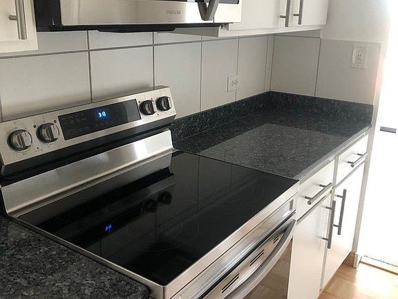 4th image of 6340 Americana Dr APT 1202