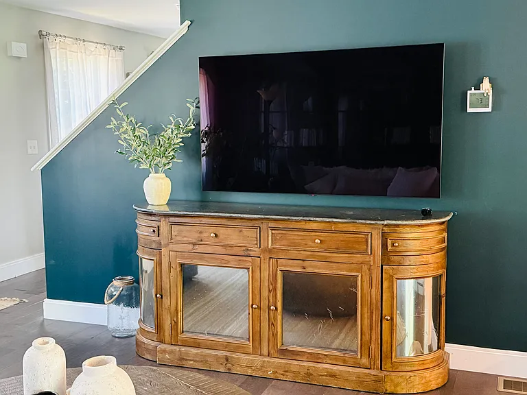 65-Inch 4K Ultra HD Smart OLED TV with remote.