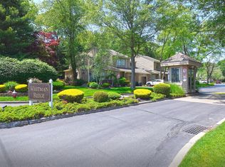 8 Whitman Ridge Dr, Melville, NY 11747