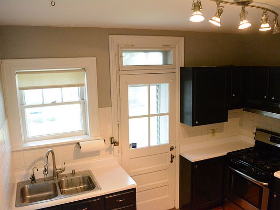 Updated kitchen with stainless steel appliances.