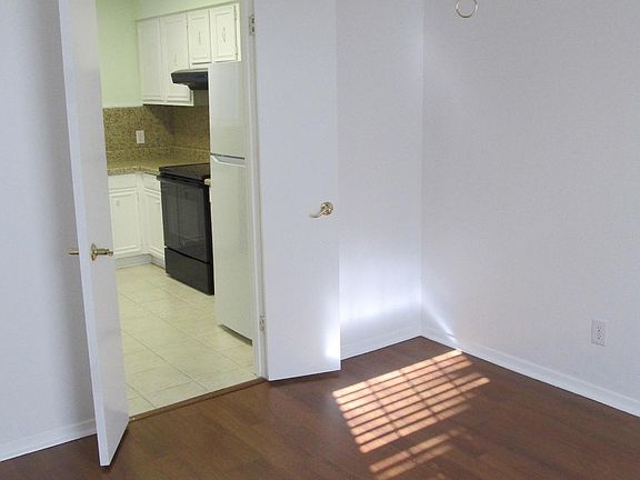 From the front door viewing the dining room and the entrance to the kitchen.
