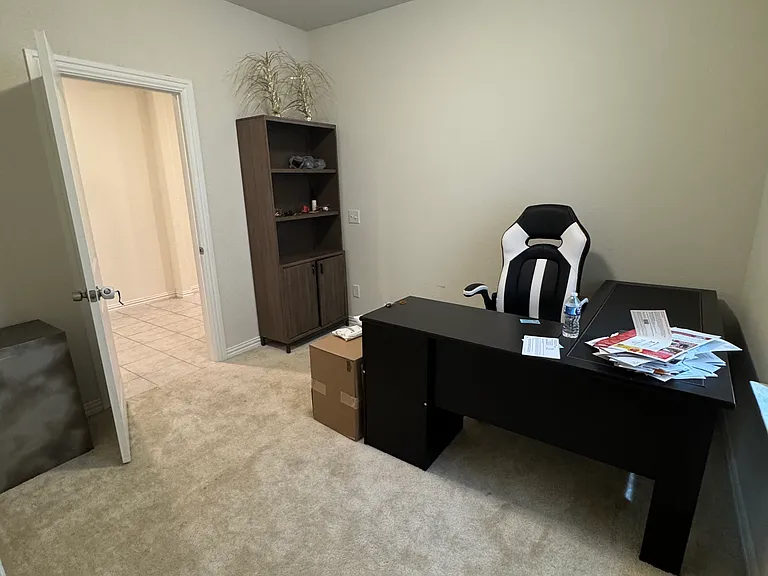 Office with large storage area downstairs.