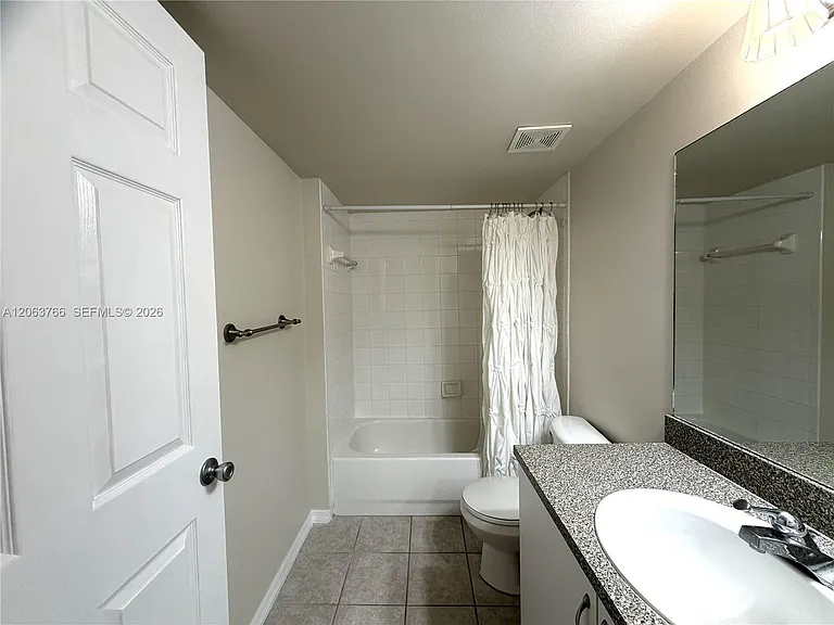 5045 Wiles Rd #201 — Photo 8