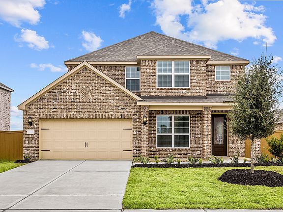 The Superior is a two story home with brick and stone.
