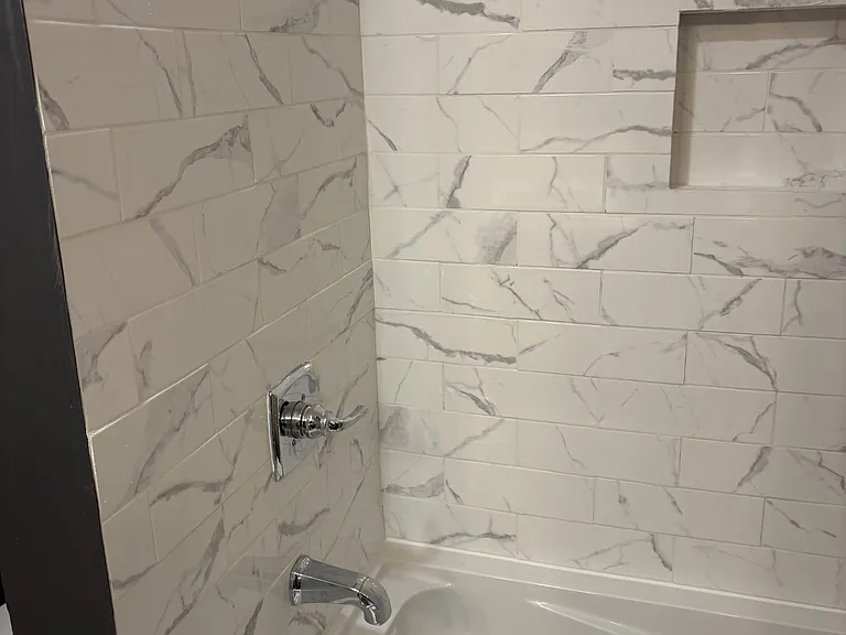 Newly renovated primary bathroom with jetted tub/shower