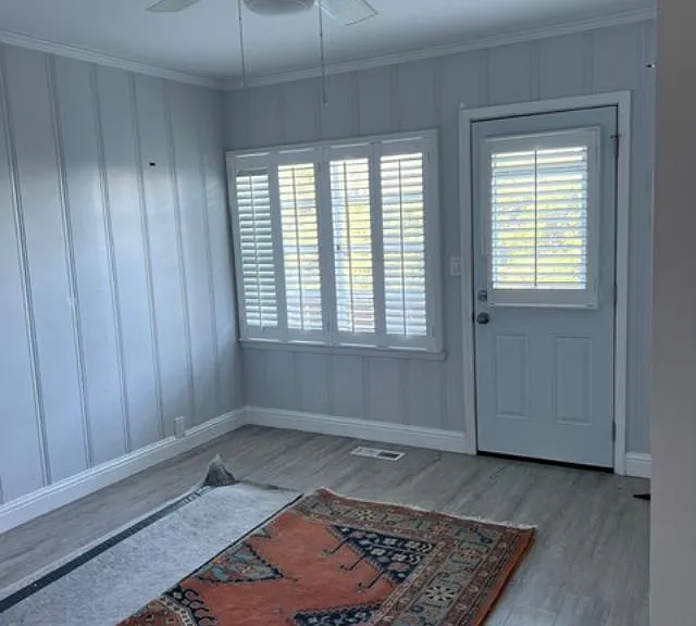 Room Private entrance from rear deck,
This room could be living room, bedroom, study etc. Overhead fan/light combination.