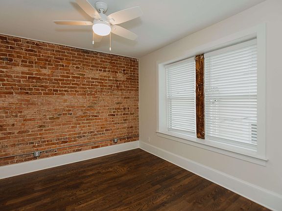 Exposed brick bedroom!
