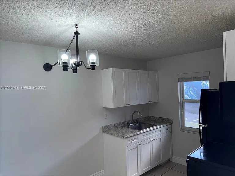 711 NE 2nd Ave #102 — Photo 8