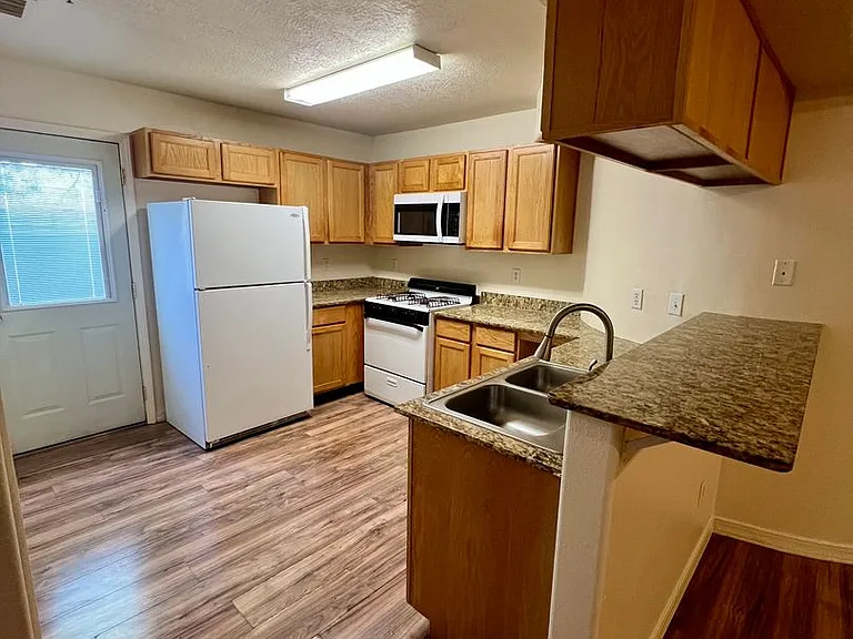 Modern Condo-Style Living Near Nob Hill & UNM $300 Off Move-In Special at The Spirals Apartments — Photo 43