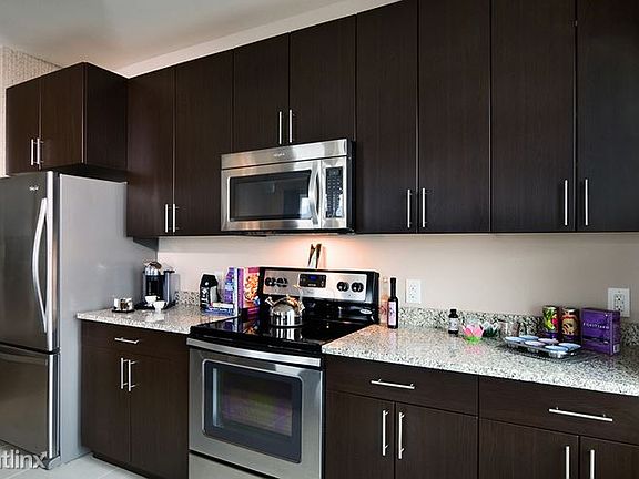 Stone counter/stainless steel kitchen