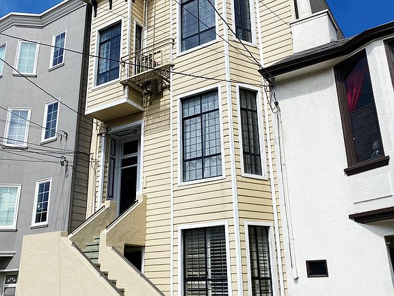 Front of building. New siding and paint.