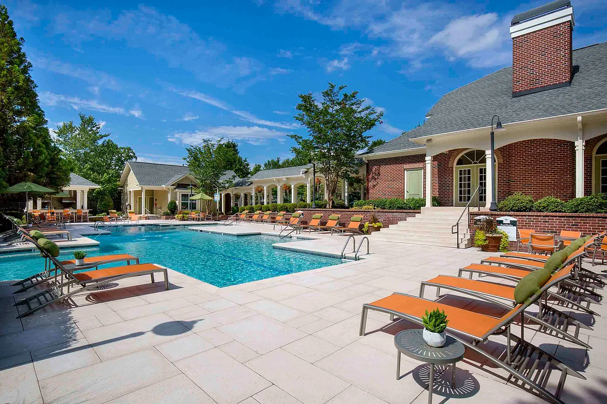 Resort-style pool and expansive sundeck with lounge seating - Creek's Edge at Stony Point