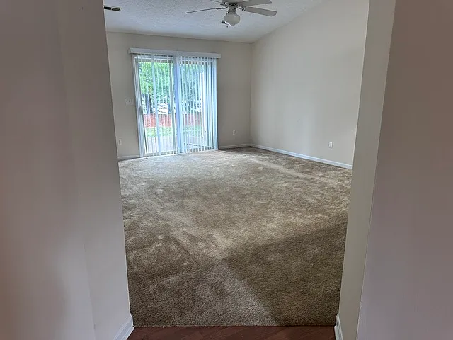 Living Room; access to a patio area