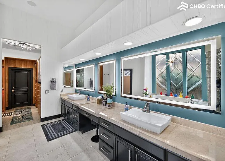 14 ft dual sinks and seated vanity with 3 lighted mirrors